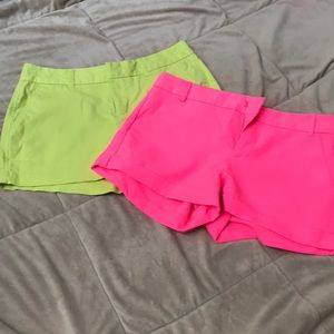 Lot of 2 neon shorts. Small & 0